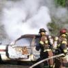 firefighters and smoking car