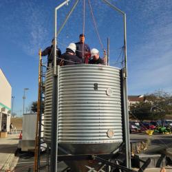 firefighters in large bin