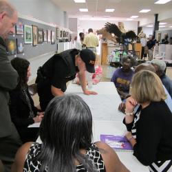 group of people watching presentation