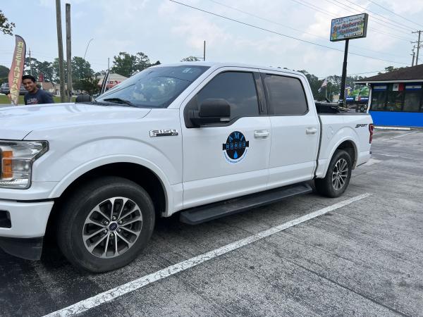 AMI truck and logo
